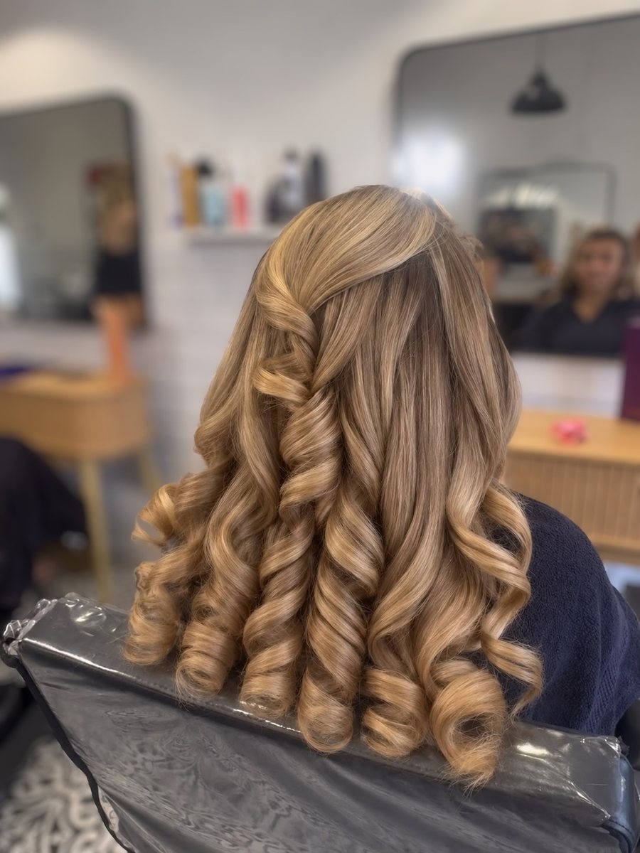 Long, bouncy curls from a curly blow dry at Mane London