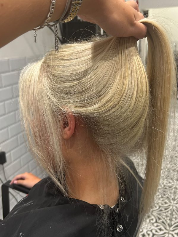Bright blonde, lifted to show the colour underneath, by Ellie